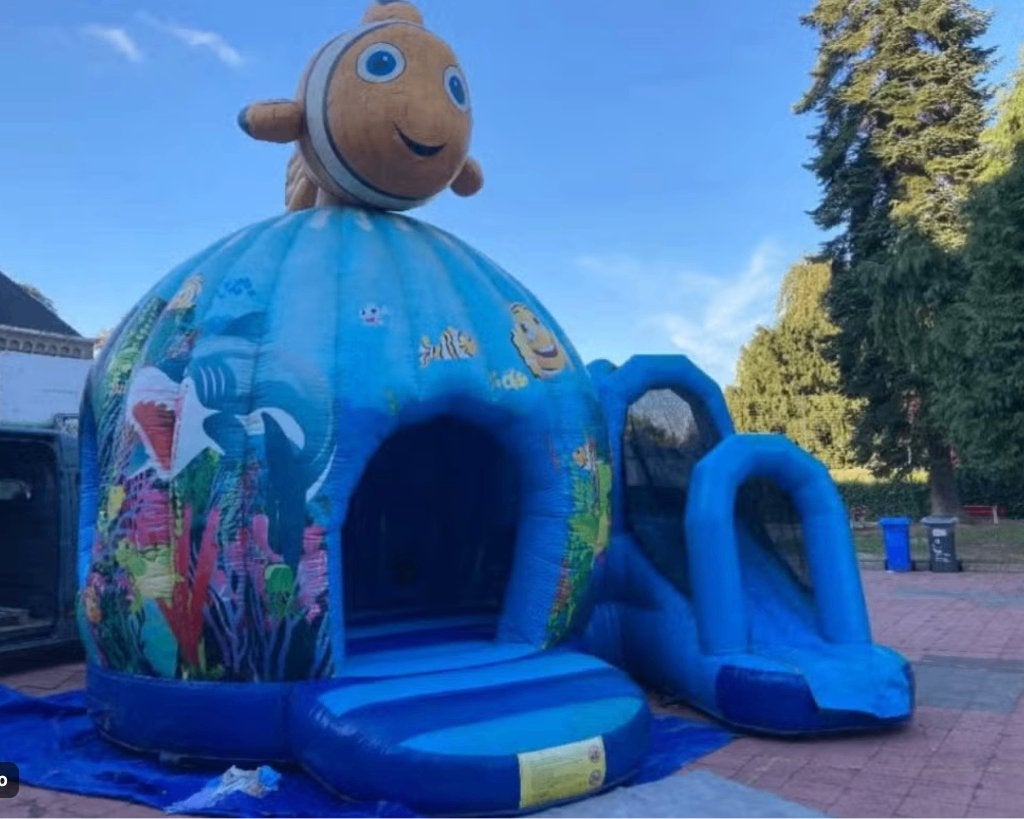 Groot Springkasteel "Nemo" met Glijbaan | 6 x 5 meter |, Ophalen, Gebruikt