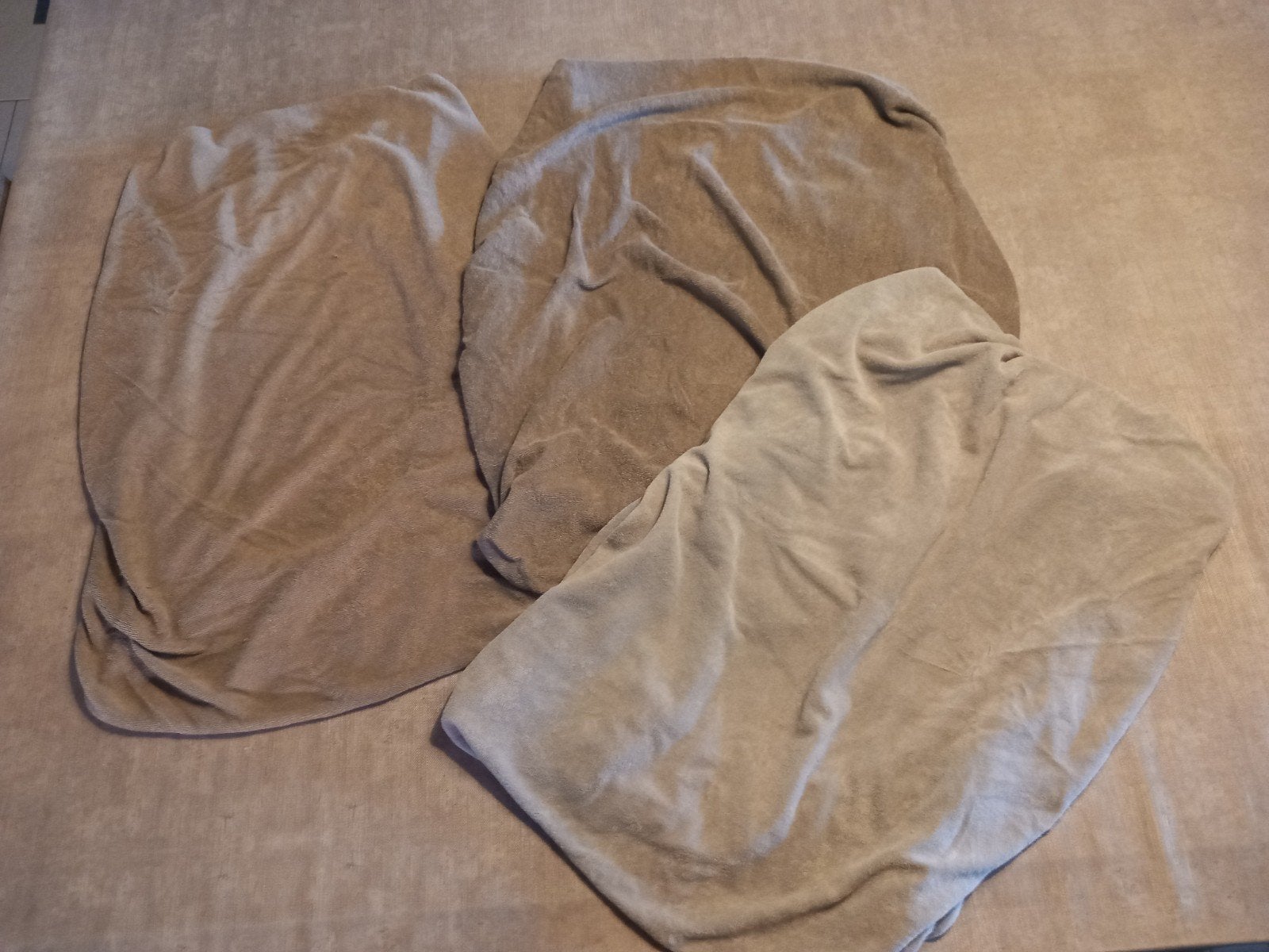 3 hoezen voor verzorgingskussen, Ophalen
