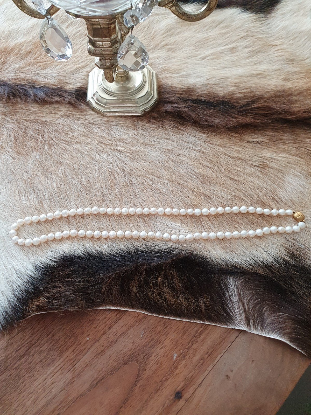 parel ketting, Ophalen
