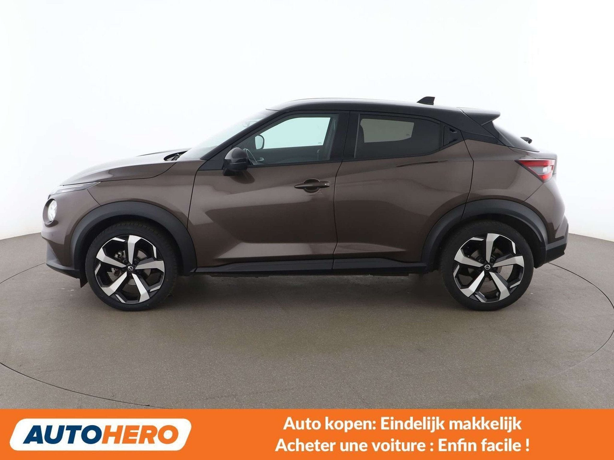 Nissan Juke 1.0 DIG-T Tekna (bj 2021, automaat), Gebruikt, Bruin, 5 zetels, 5 deurs