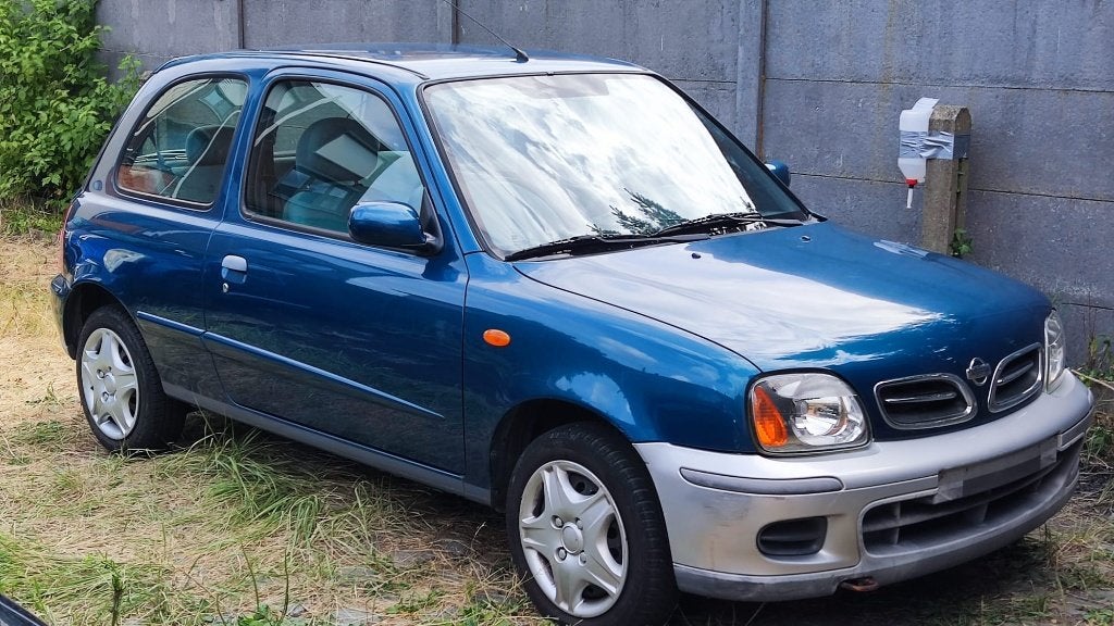 Nissan Micra benzine, Voorwielaandrijving, Stof, Beige, Blauw
