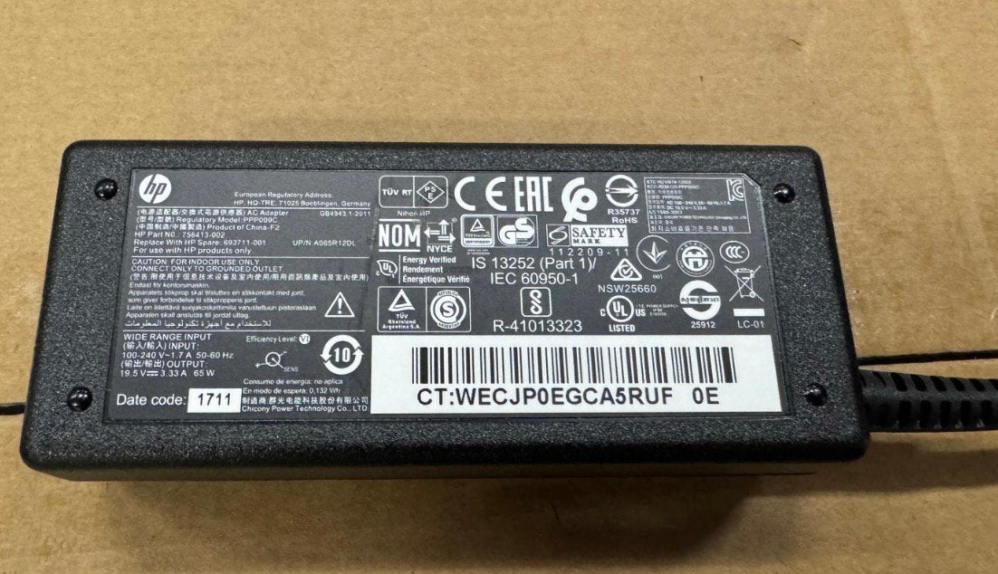 HP 65W computeroplader, Computers en Software, Laptop-opladers, Ophalen of Verzenden, Zo goed als nieuw