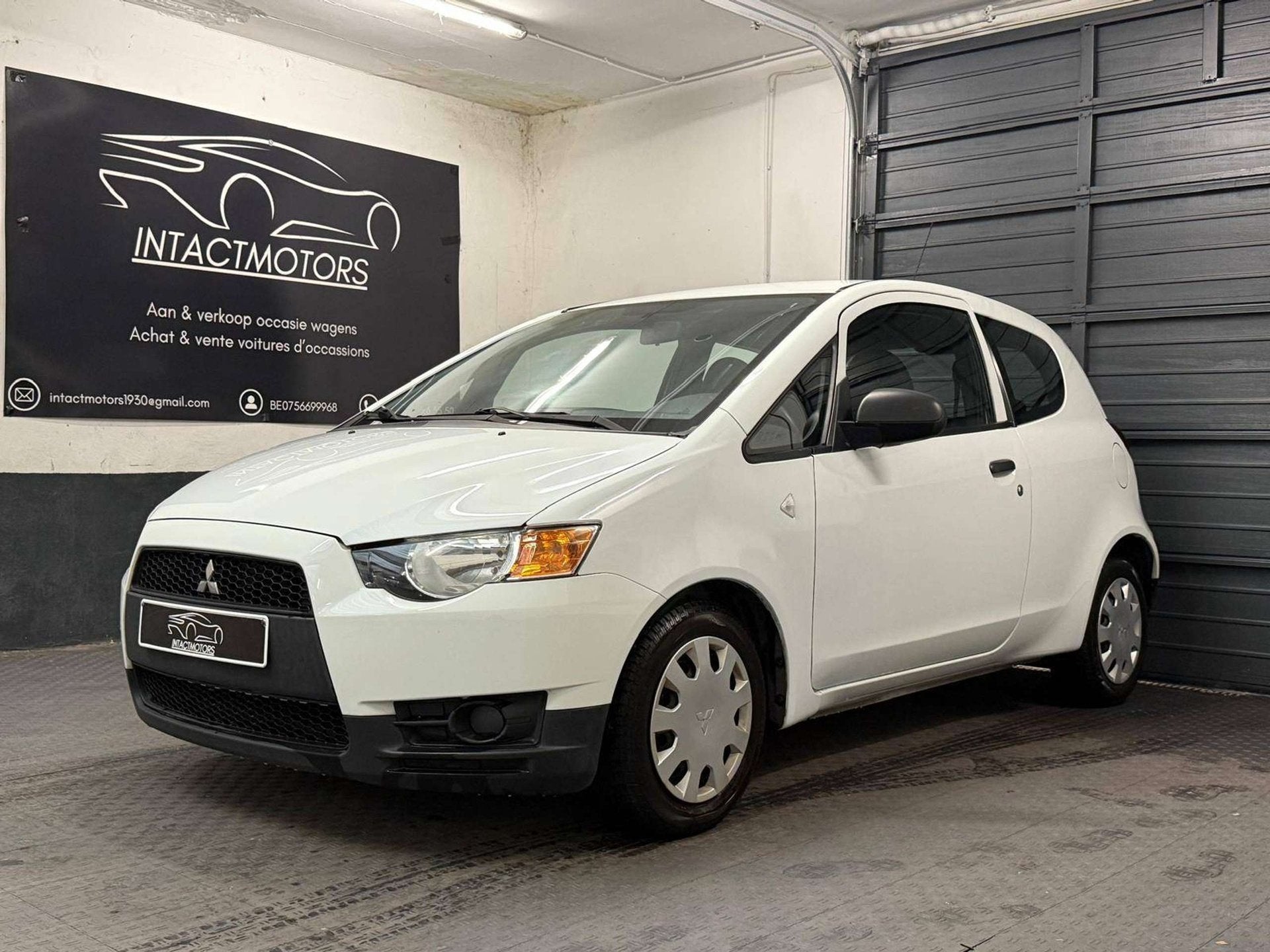 Mitsubishi Colt Colt 1.1i, Auto's, Zwart, Bedrijf, 130 g/km, 3 cilinders