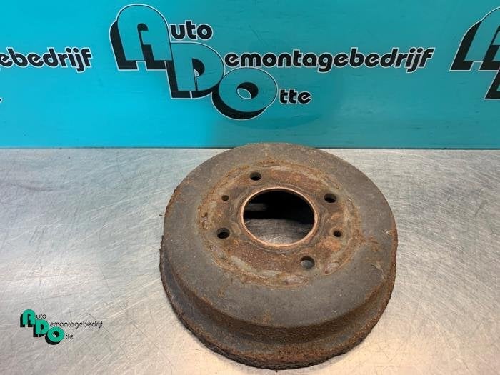 Tambour de frein arrière d'un Mitsubishi Colt (Colt 04-), -, 3 mois de garantie, Utilisé, Mitsubishi