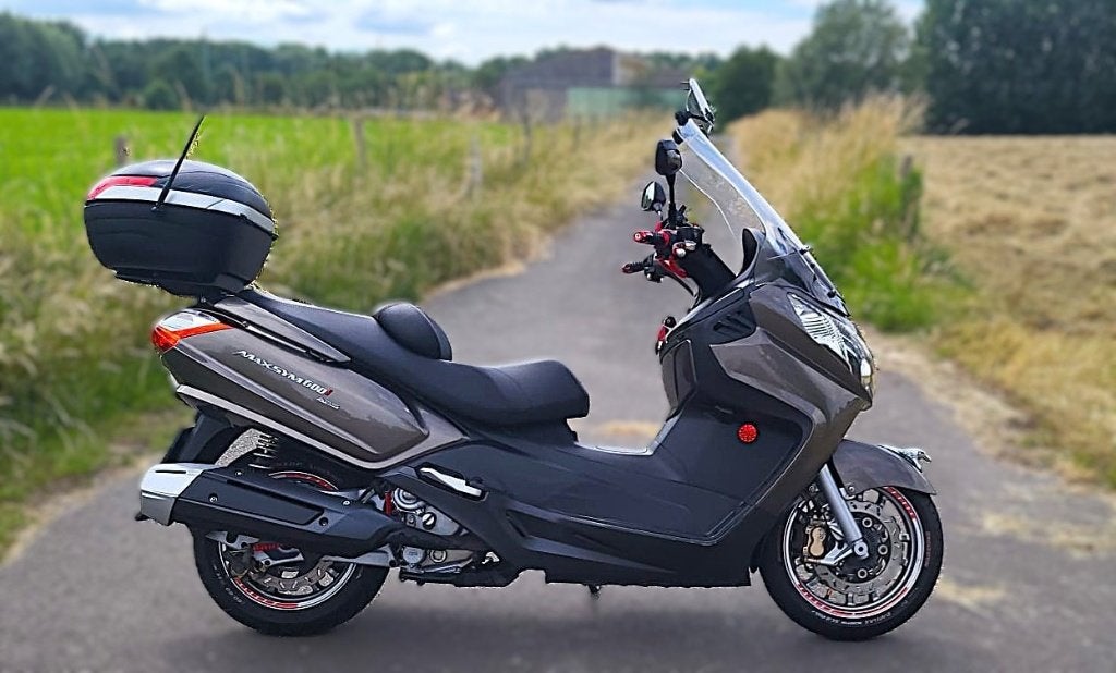 Sym Maxsym 600i comme neuf, Motos, Scooter, Contrôle de traction, Sym, Neuf