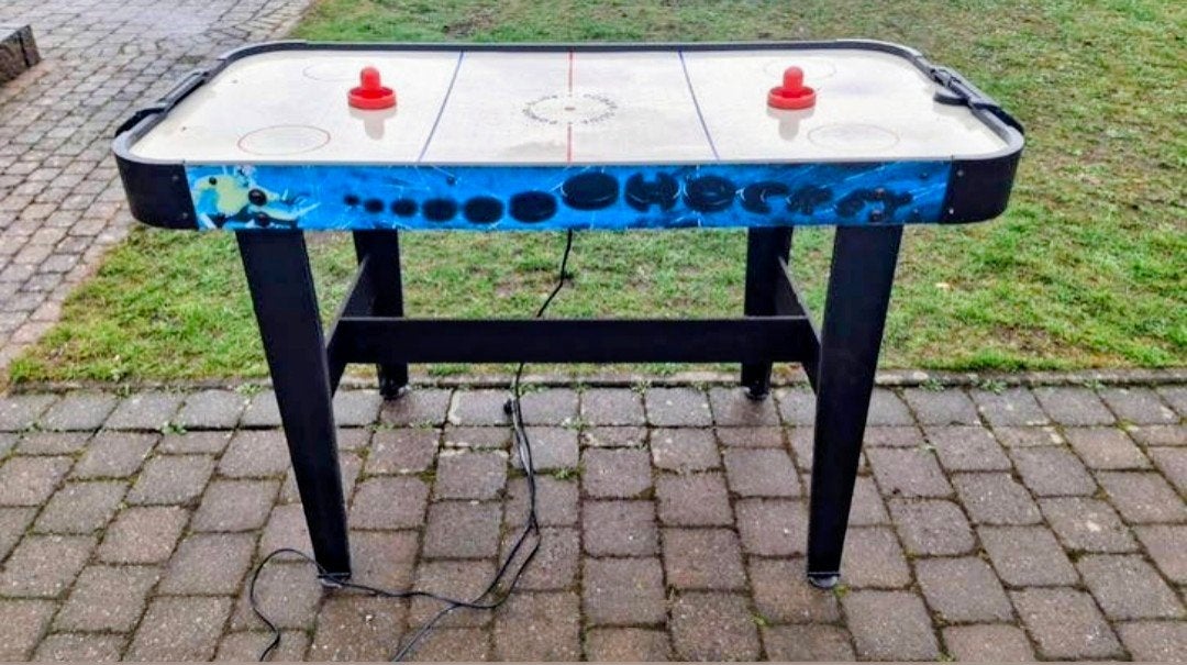 Airhockeytafel, Ophalen