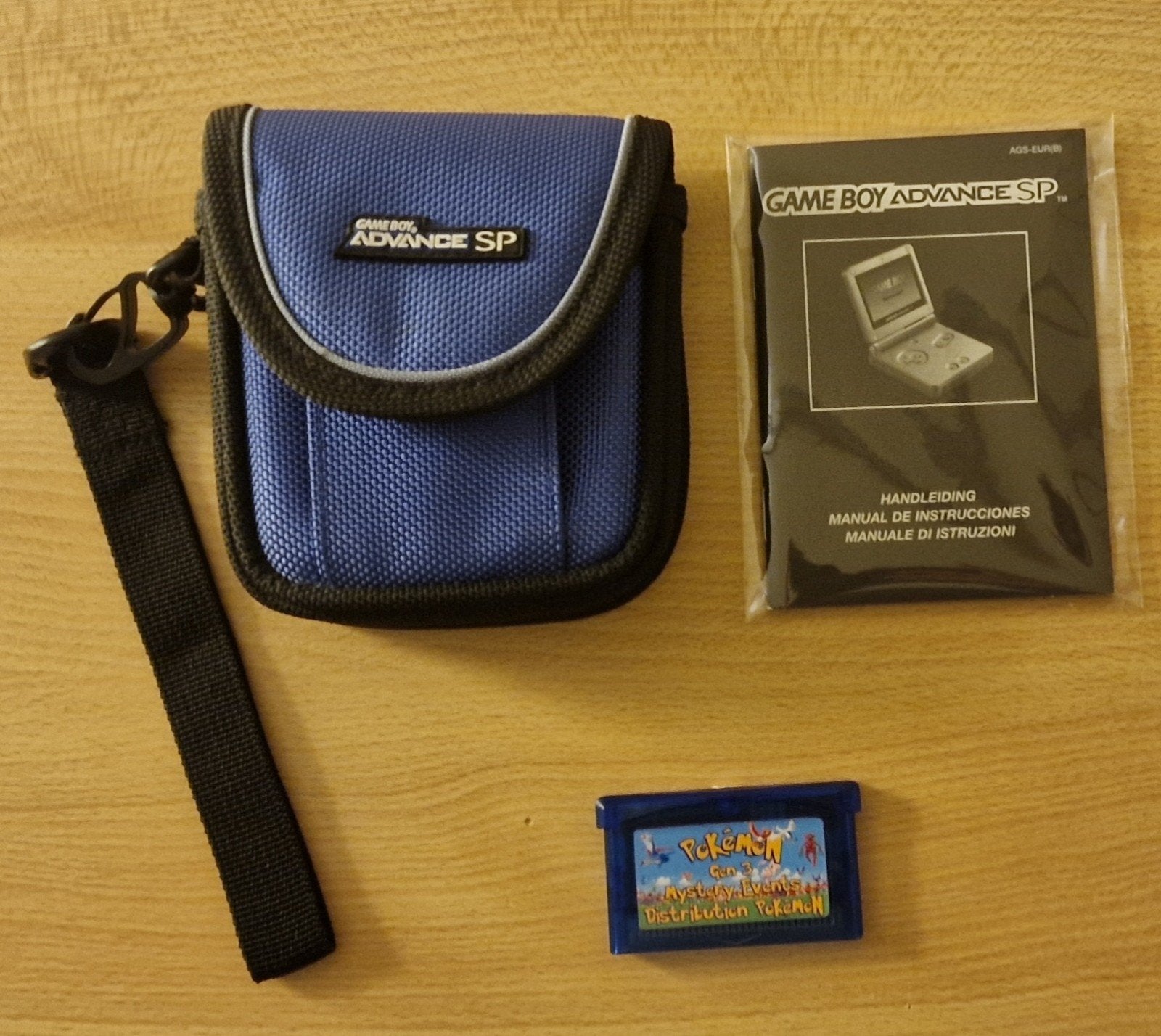 GBA SP travel case met boekje van de SP en Mystery event, Ophalen of Verzenden, Zo goed als nieuw, Game Boy Advance SP, Met games