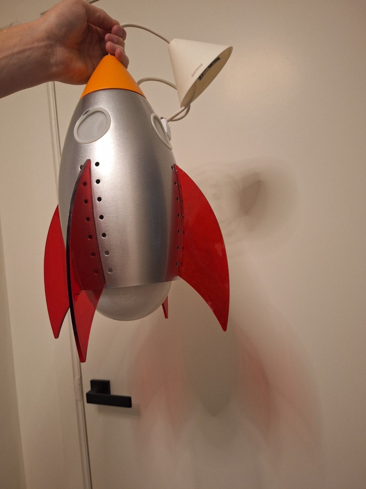 Raket hanglamp, Enlèvement