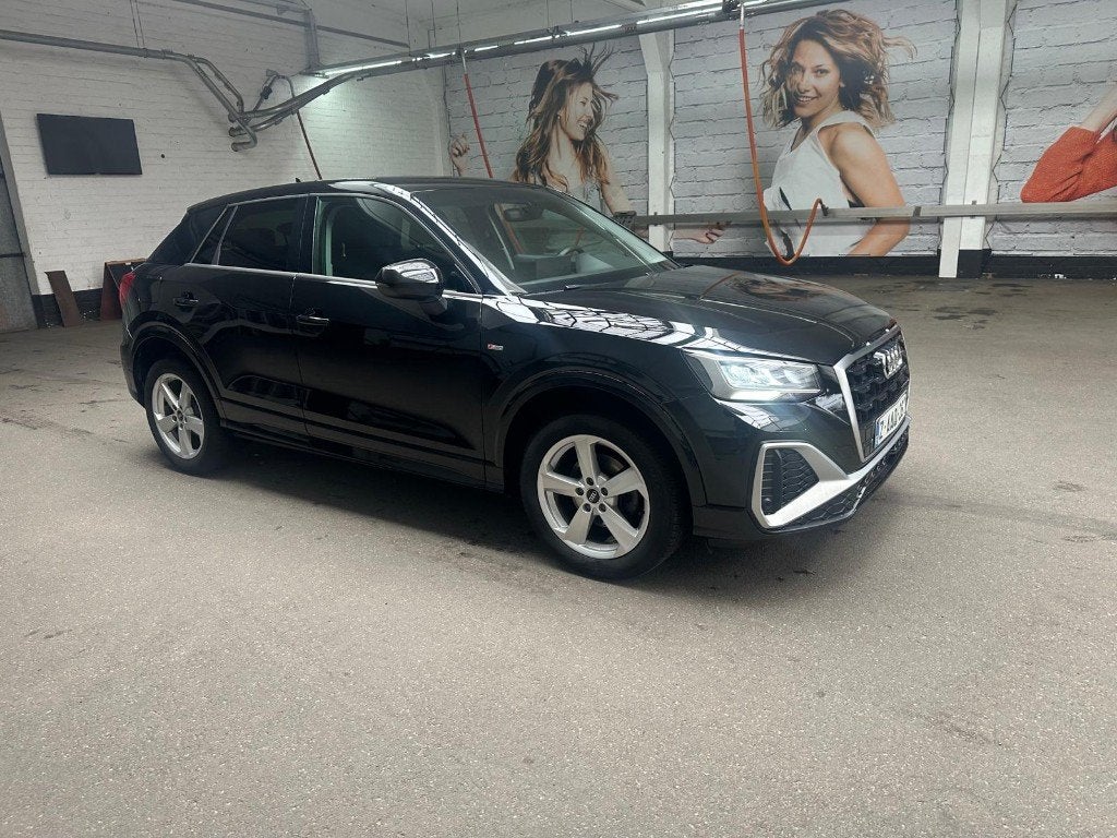 Audi Q2 S-Line 1.5 benzine 150pk automaat, Auto's, 1380 kg, 4 cilinders, Zwart, 5 zetels