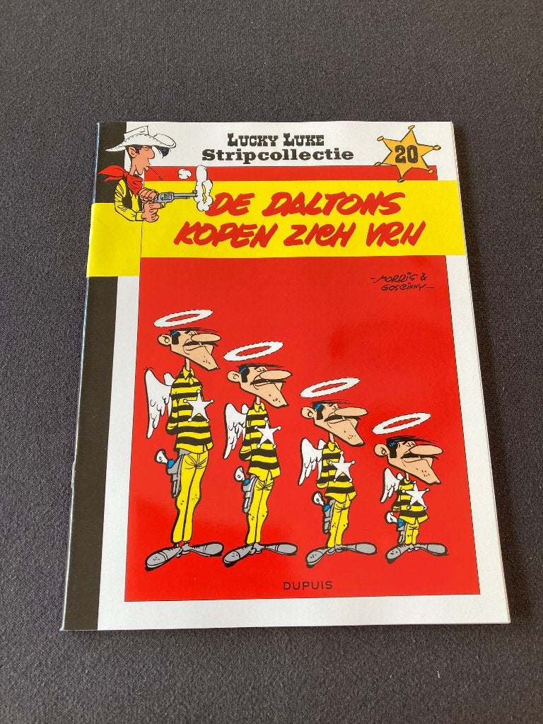 Strip 'De Daltons kopen zich vrij' Morris & Goscinny 1x gele, Ophalen of Verzenden, Zo goed als nieuw, Morris & Goscinny,