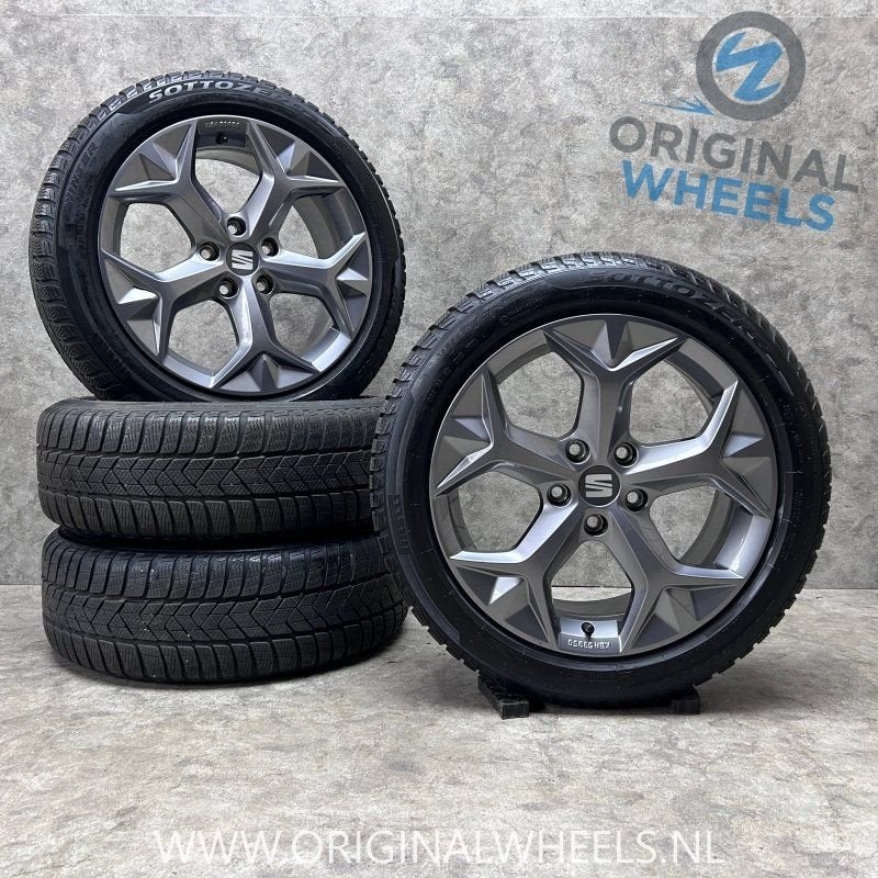 17 inch originele velgen + winterbanden Seat Leon 575071497H, Autos : Pièces & Accessoires, Pneus et Jantes, Pneus hiver, -, 205 mm