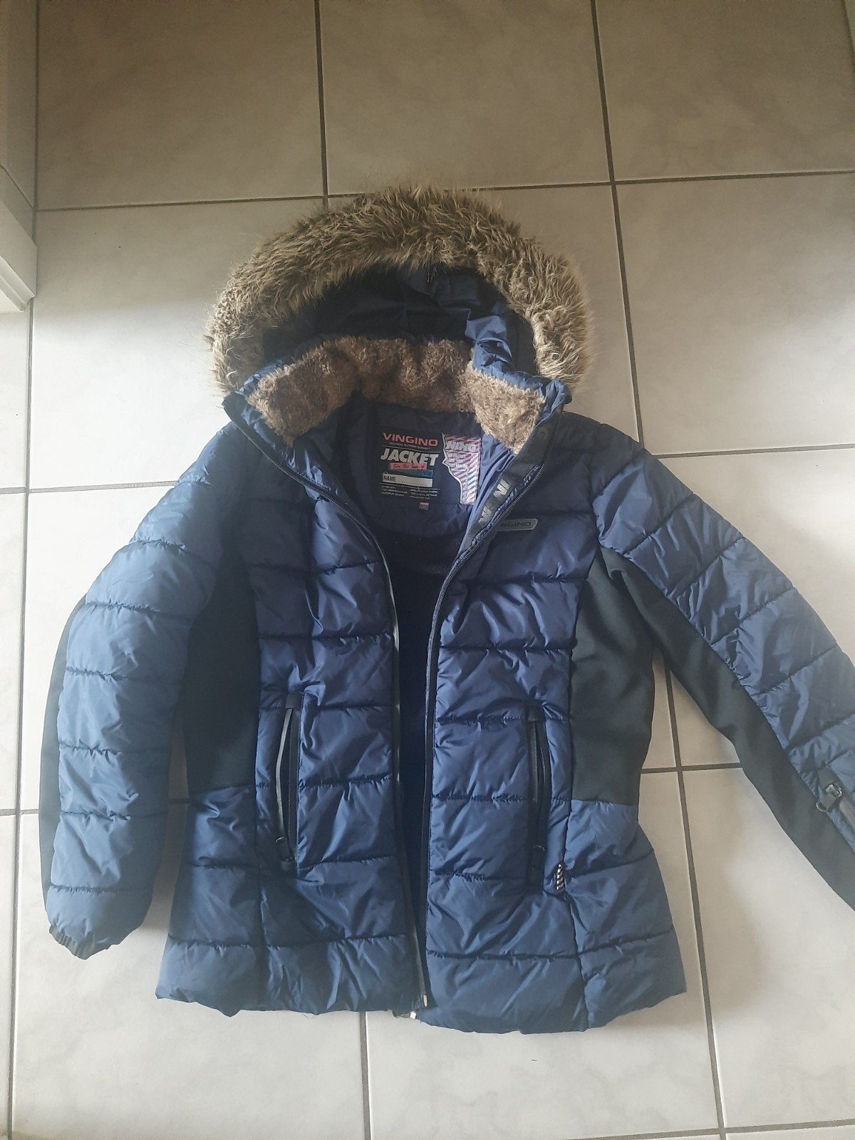 winterjas 14 jaar, Ophalen