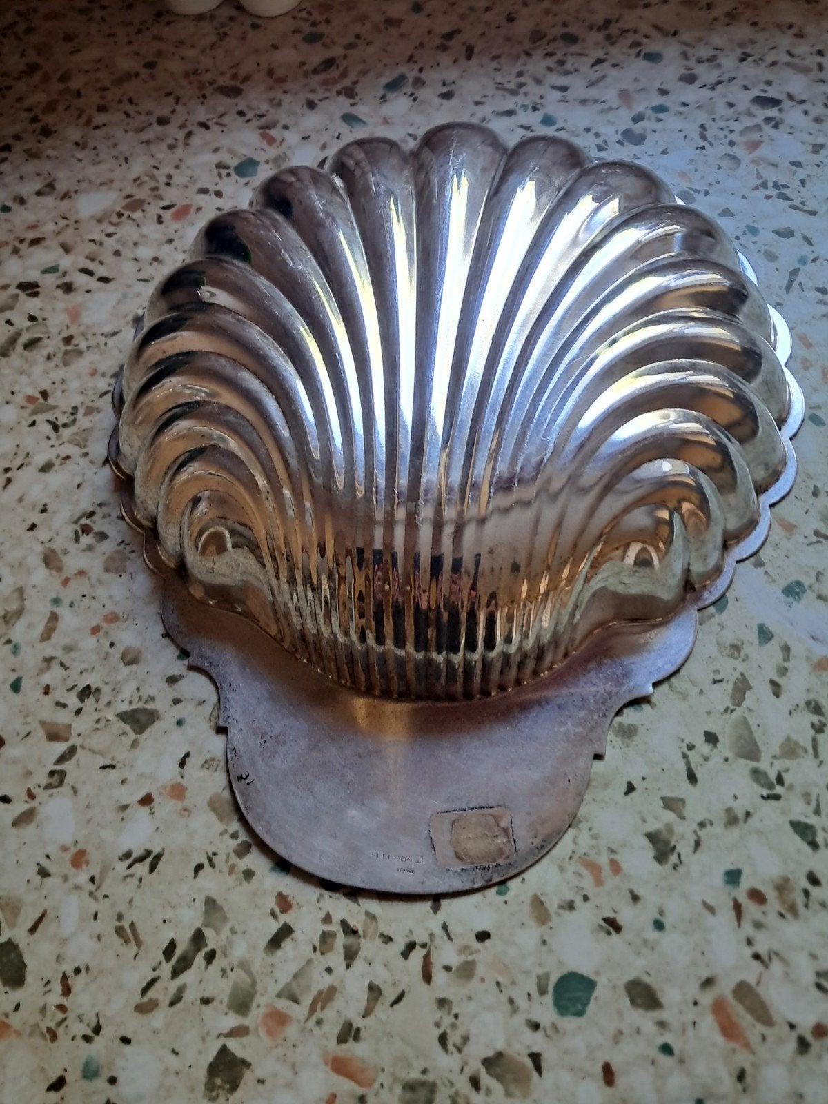 plat en métal argenté, Enlèvement