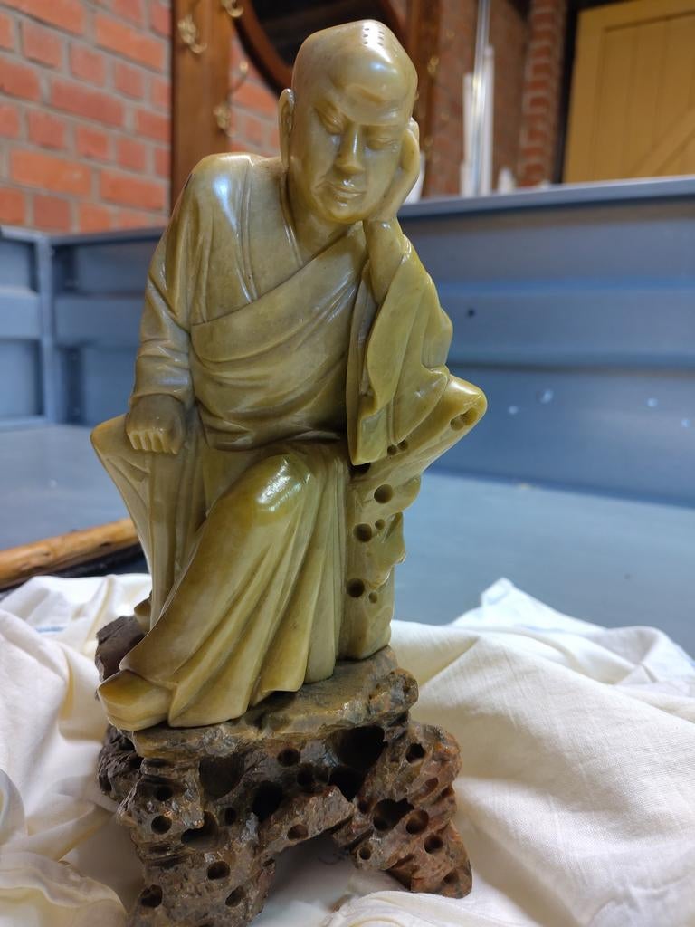 Monnik op rots, Ophalen