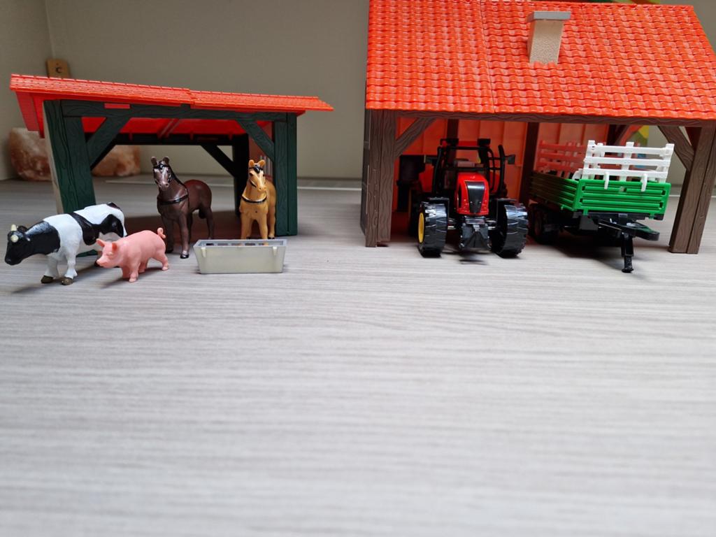 Boerderij met tractor en dieren, Ophalen