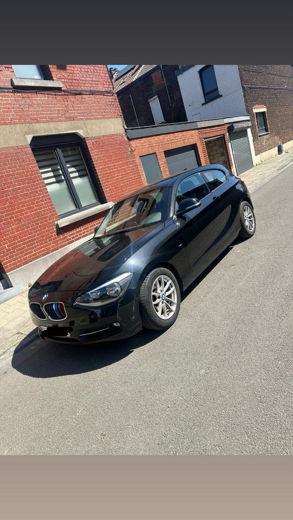 BMW serie 1 sport 116D, Auto's, Zwart, Multifunctioneel stuurwiel, Te koop, 85 kW