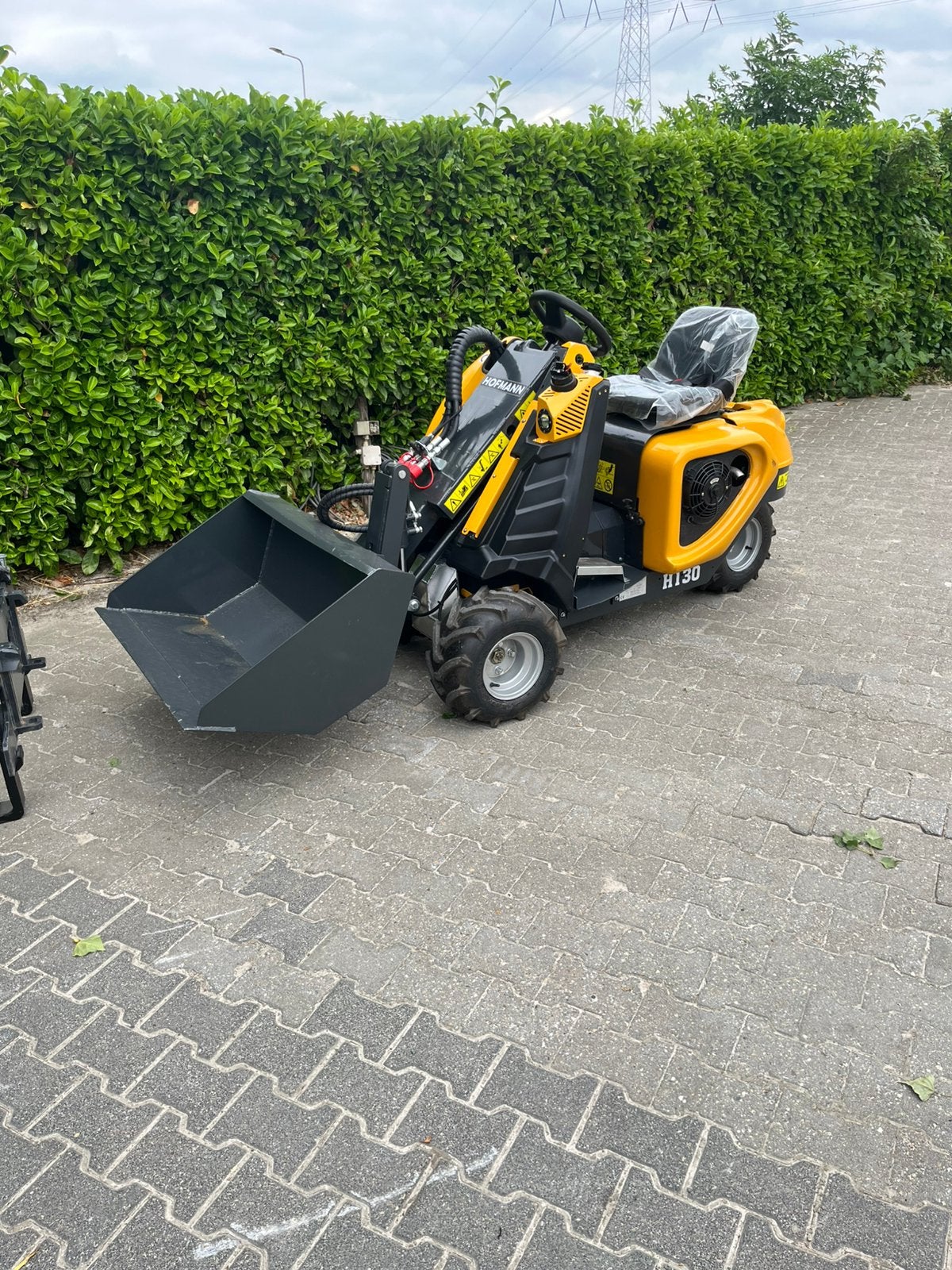 Hofmann H130 mini shovel uniek!, Zakelijke goederen, Machines en Bouw | Kranen en Graafmachines, Verzenden, Wiellader of Shovel