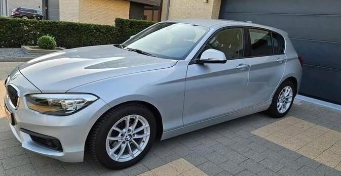 BMW 116i – 58.537 km – Goed onderhouden, Stof, Euro 6, Navigatiesysteem, Particulier