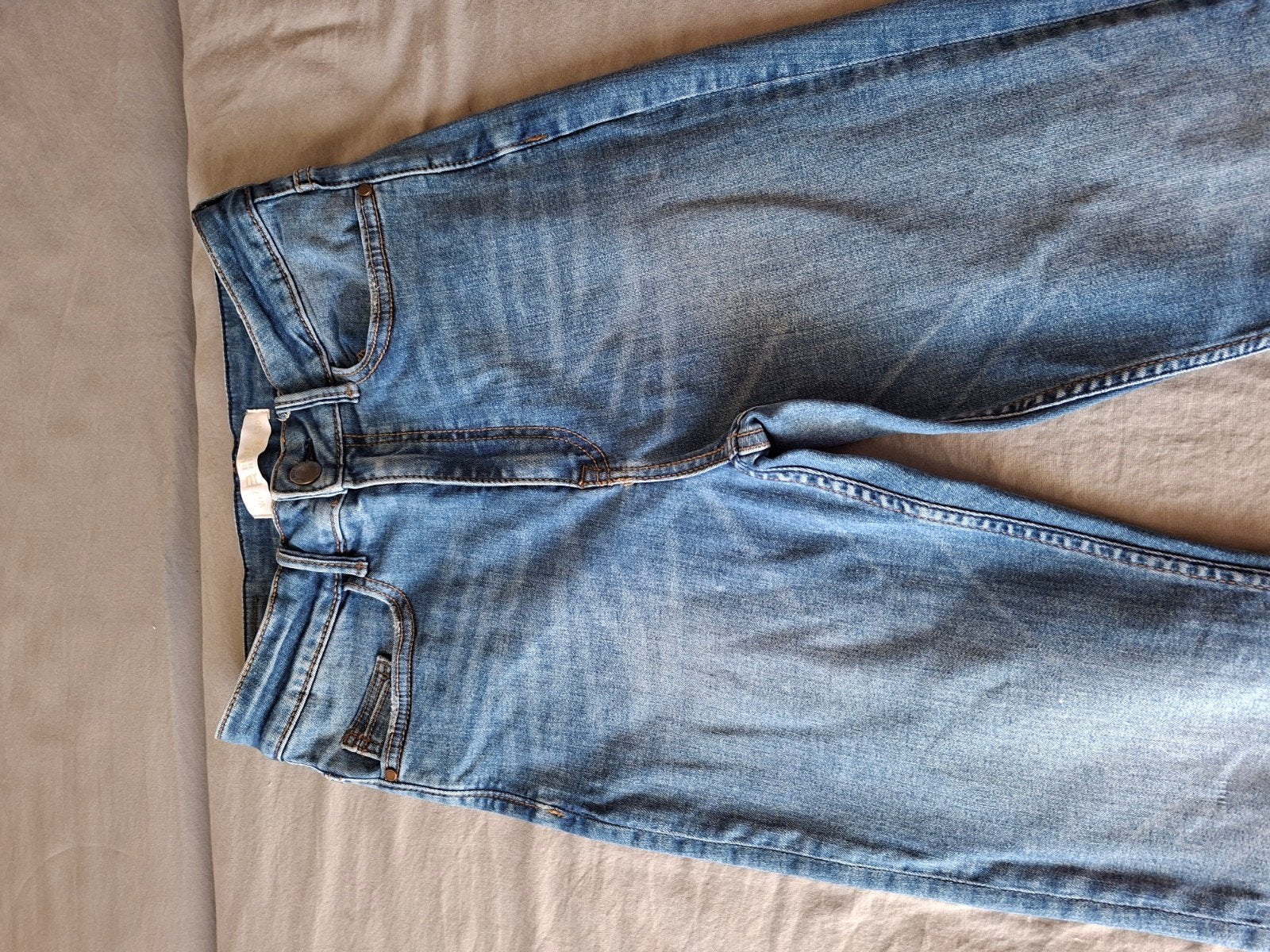 Skinny jeansbroek, Ophalen