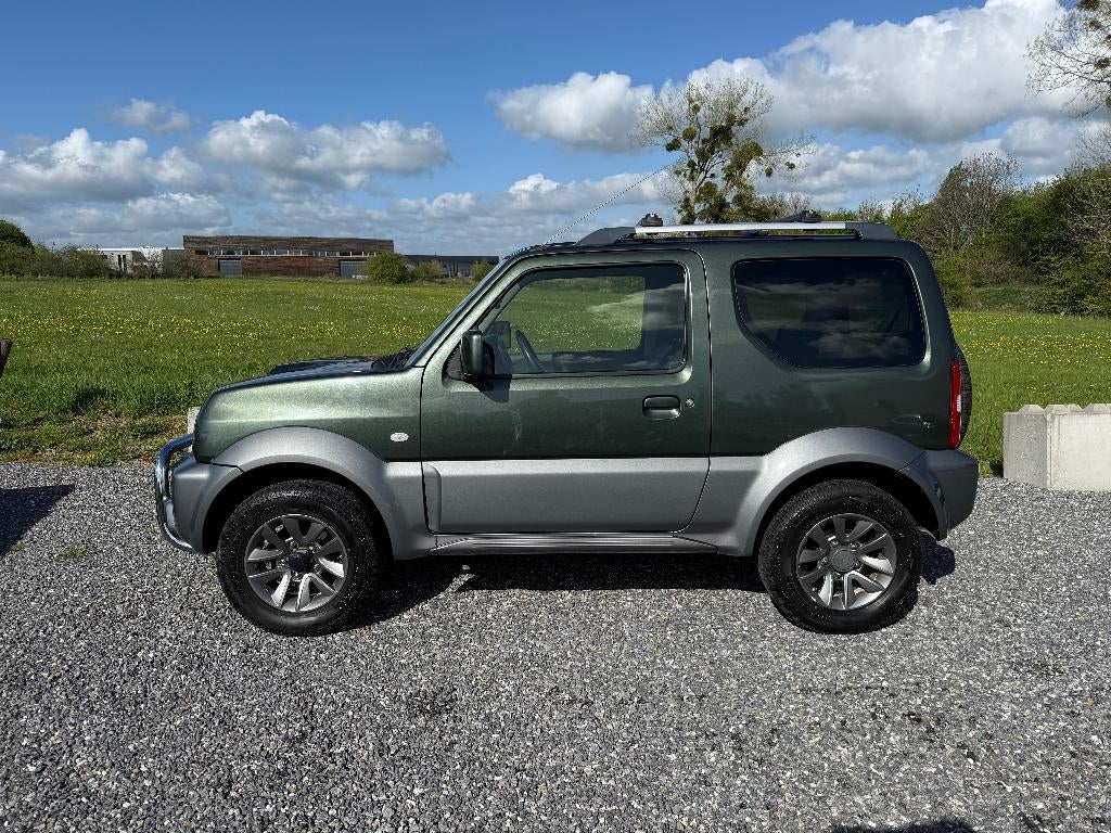 Suzuki Jimny 1.3 85CH DAKOTA **Cuir 4X4 Clim Attelage**, Auto's, Suzuki, 1328 cc, Handgeschakeld, Vierwielaandrijving, 4x4