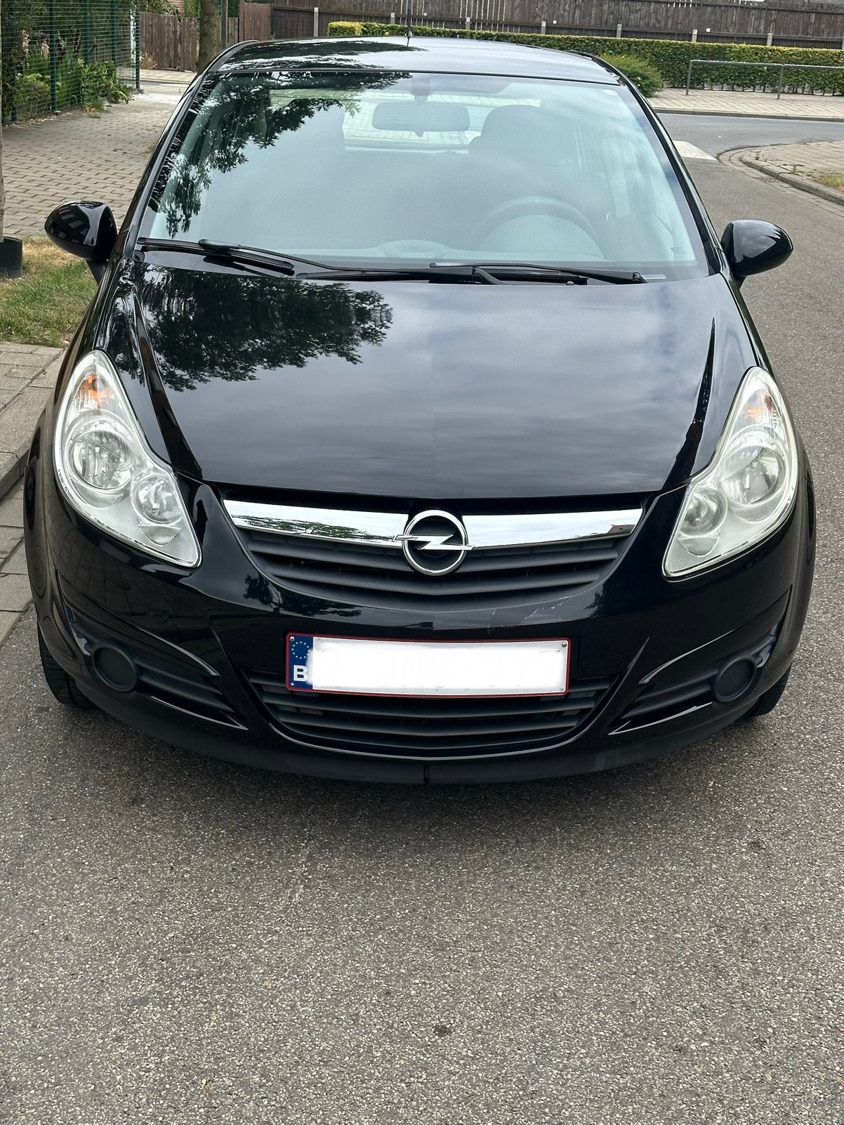 Opel Corsa 1.3 Benzine–2010–Km 28.000–Gekeurd voor verkoop, Auto's, Opel, Stof, Zwart, Adaptieve lichten, Zwart
