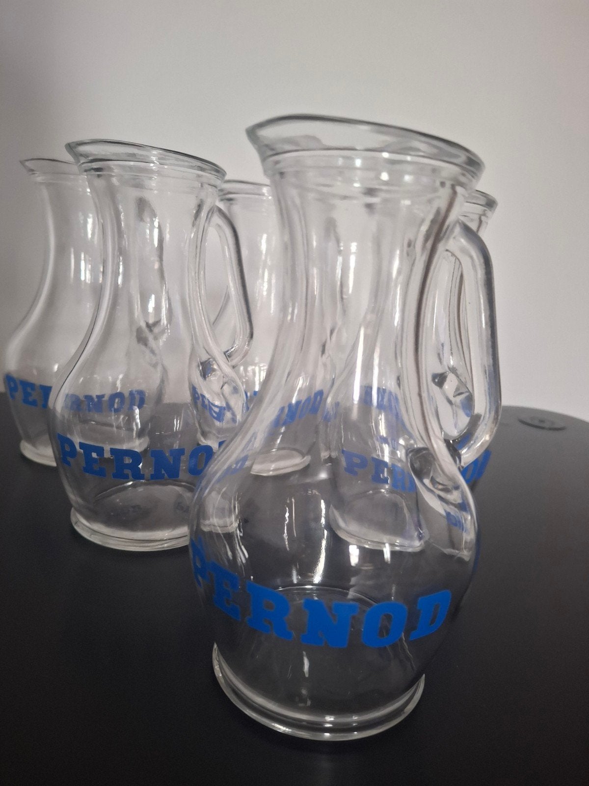 Pernod waterkaraf, Ophalen