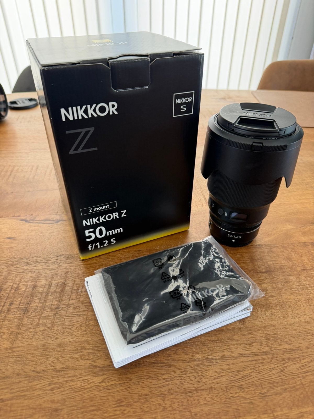 Nikon Z 50mm 1.2 S, Enlèvement ou Envoi, Comme neuf, Accessoires