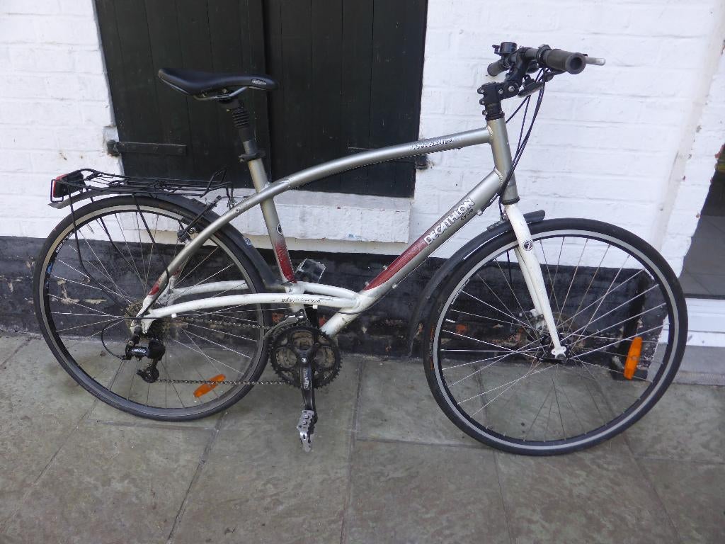 sportfiets decathlon triban met 27 versnellingen - alu kader, Fietsen en Brommers, Ophalen, 28 inch, Gebruikt, Meer dan 20 versnellingen
