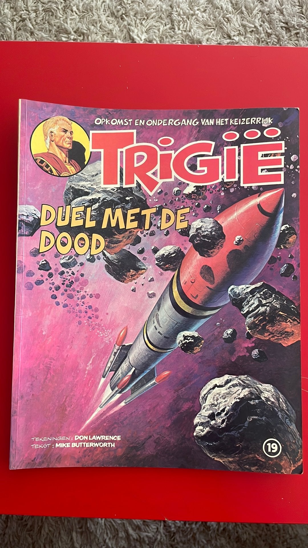 Trigië 19 - Duel met de dood Lawrence / Butterworth, Boeken, Ophalen of Verzenden, Gelezen, Don Lawrence