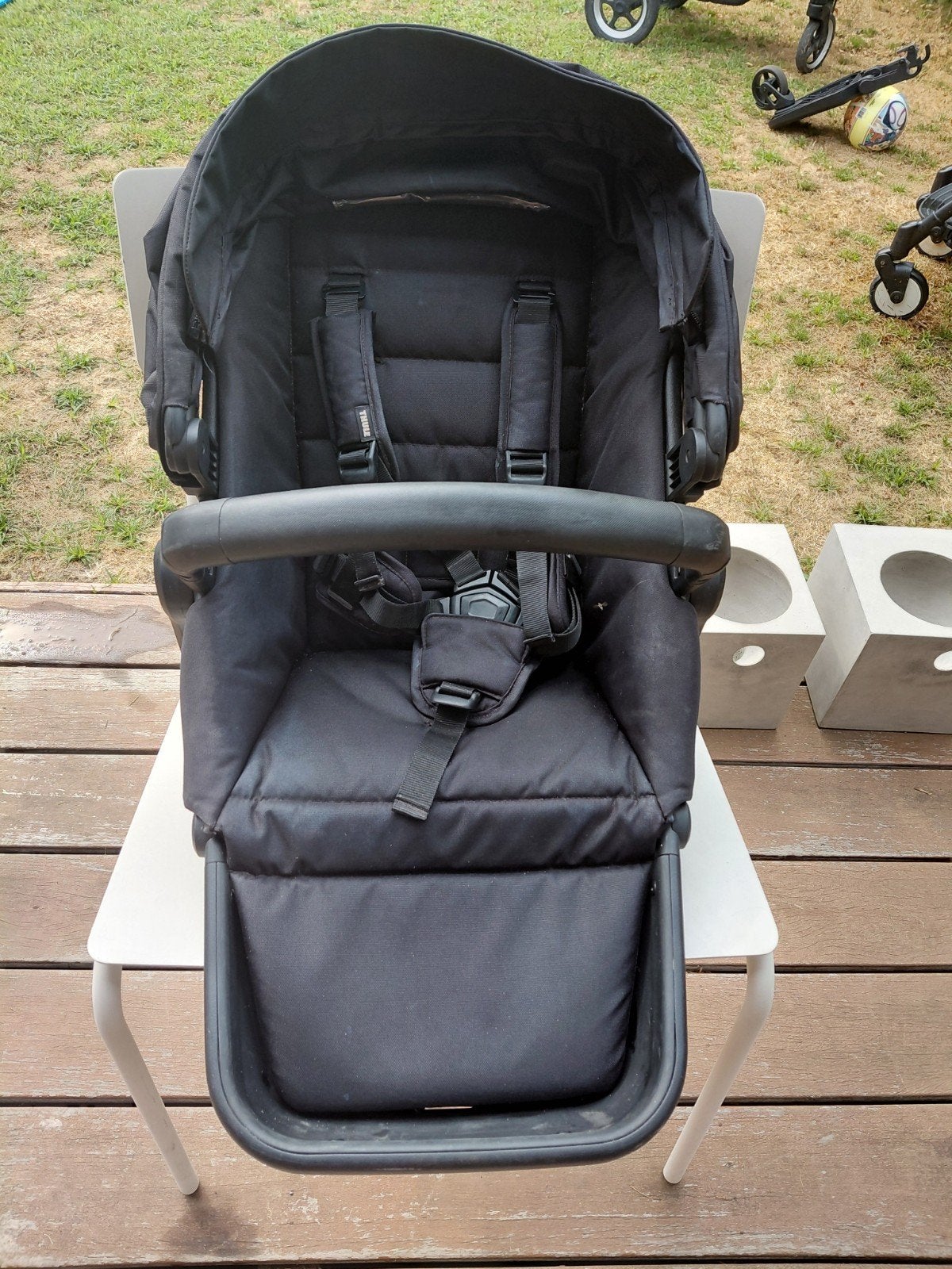 thule sleek extra kinderzitje, Enlèvement