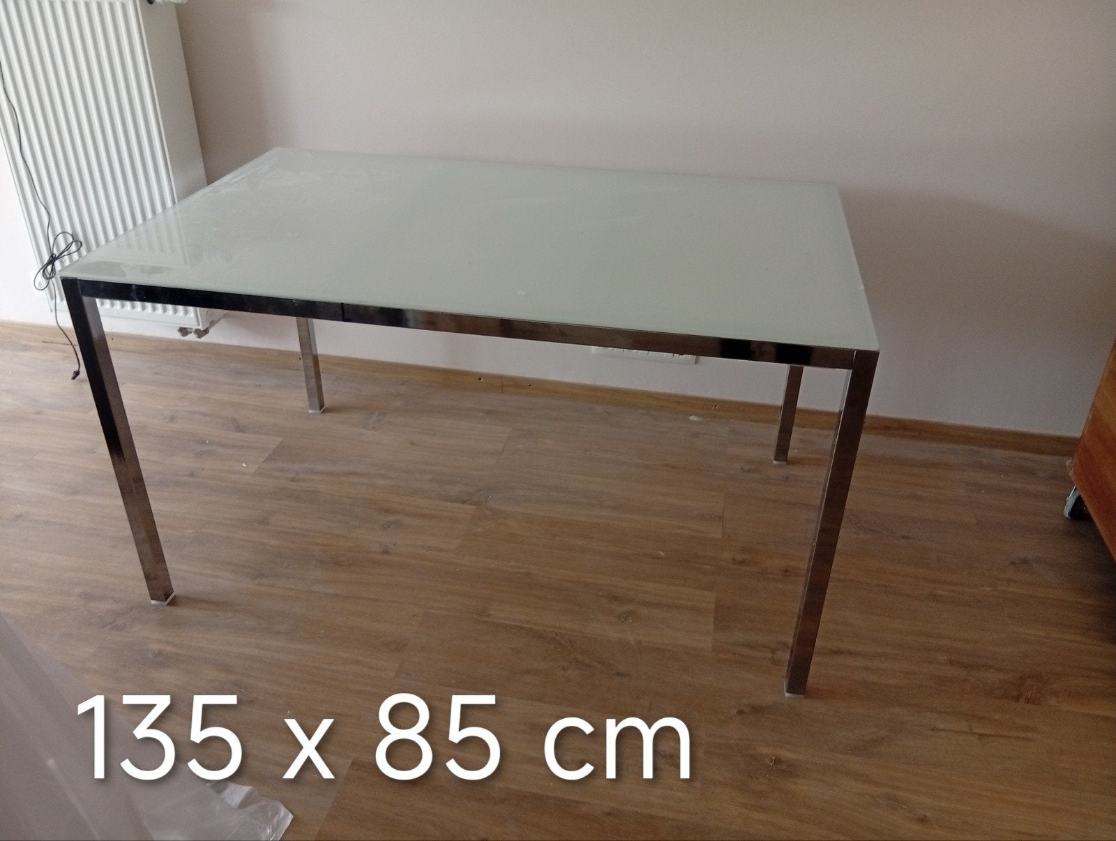 tafel met glazen blad, Ophalen