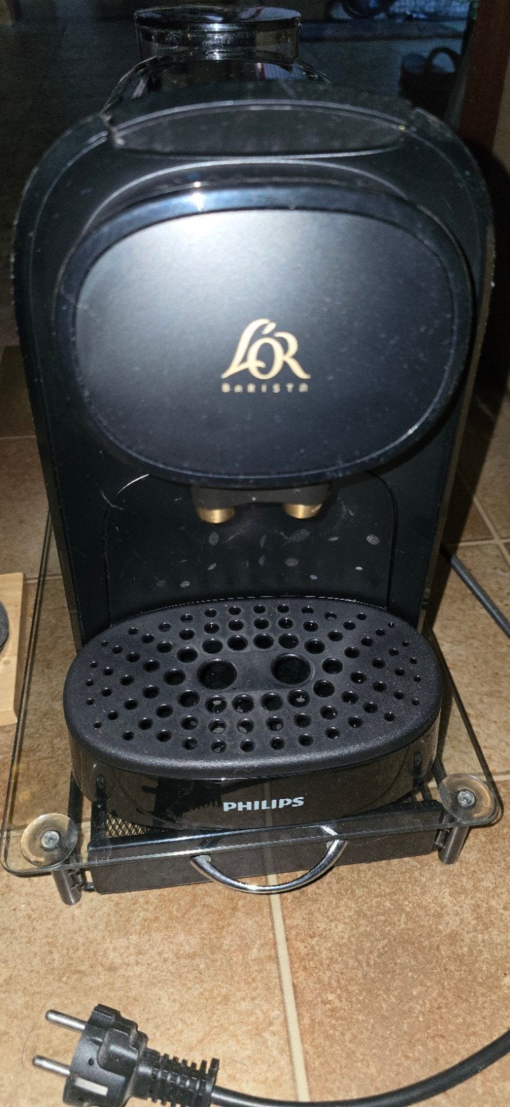 l'or barista met koffie, Enlèvement
