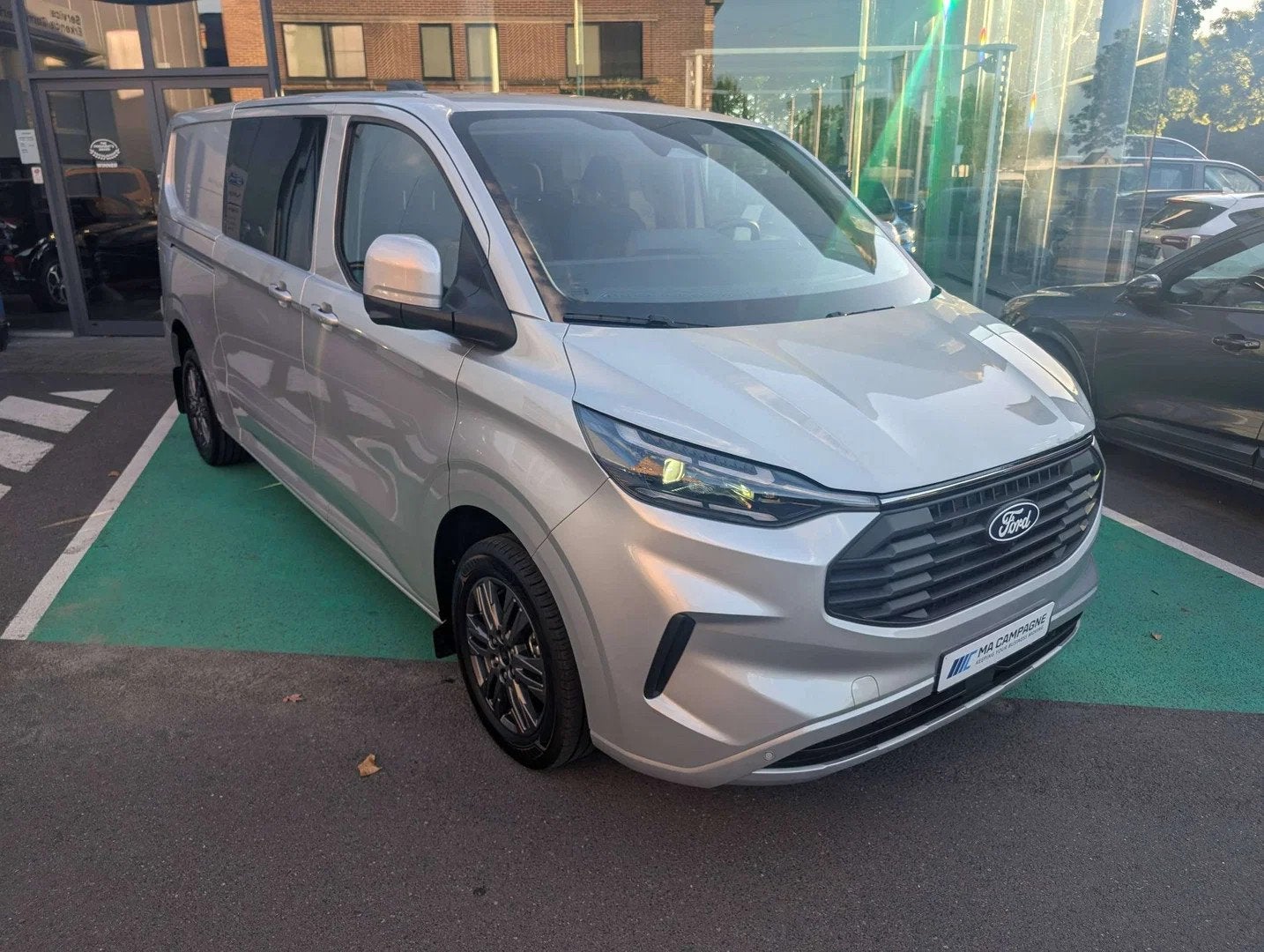 Ford Transit Custom DC 6pl Limited 320L L2 2.0TDCi 170pk A8, Auto's, Automaat, 4 deurs, Stof, Gebruikt