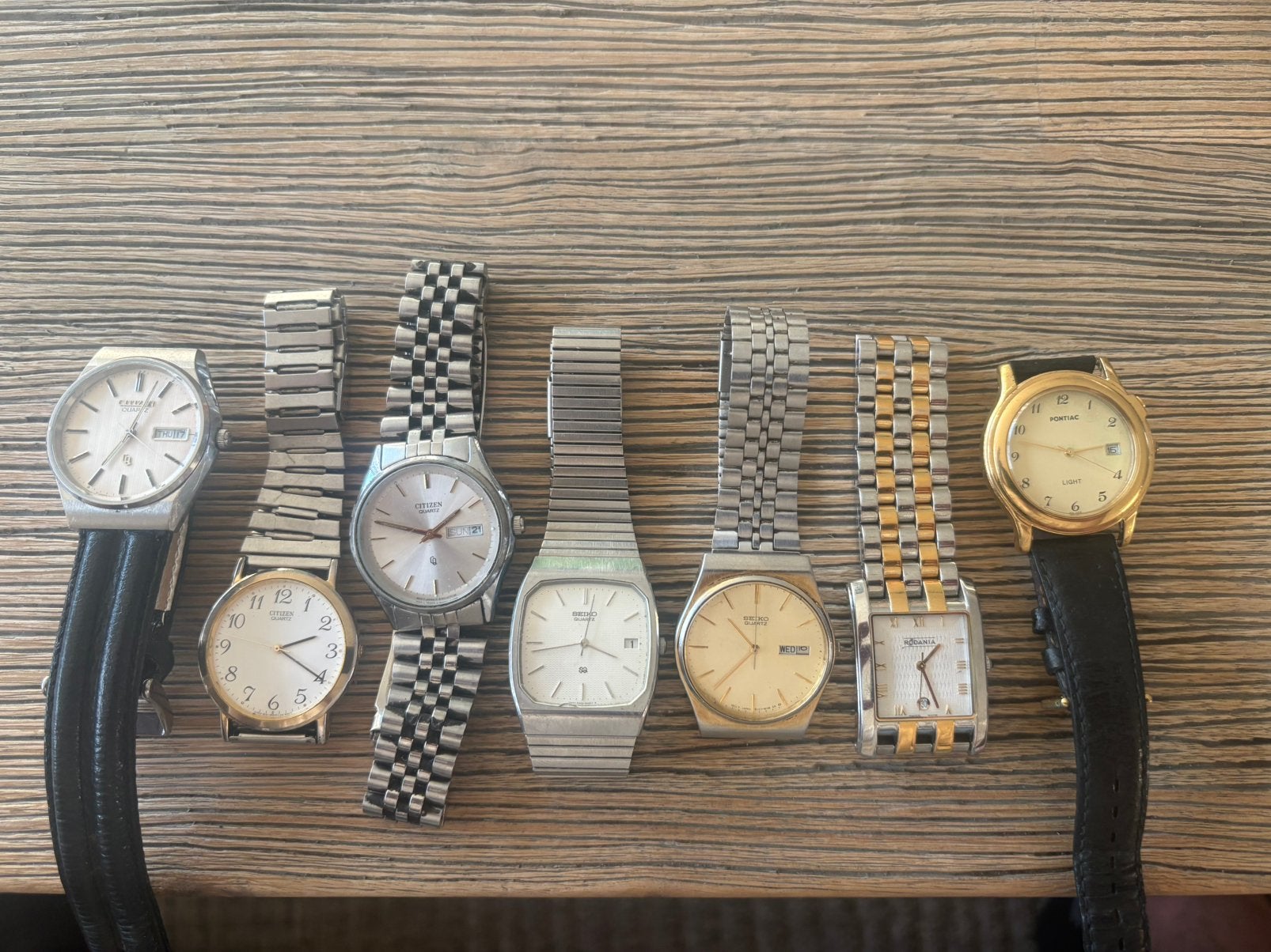 7 herenhorloges quartz: seiko/ citizen/ pontiac en rodania, Ophalen of Verzenden, Seiko