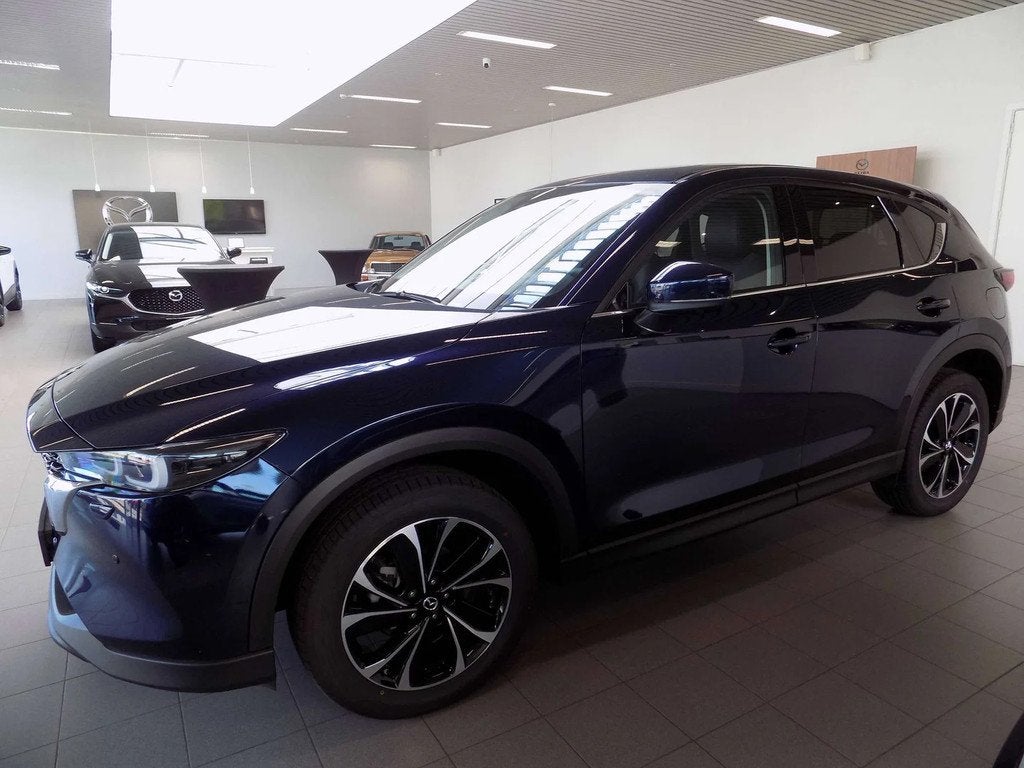Mazda CX-5 2.0i e-SKYACTIV-G MHE 2WD Exclusive-Line, 1998 cc, Euro 6, 4 cilinders, Blauw