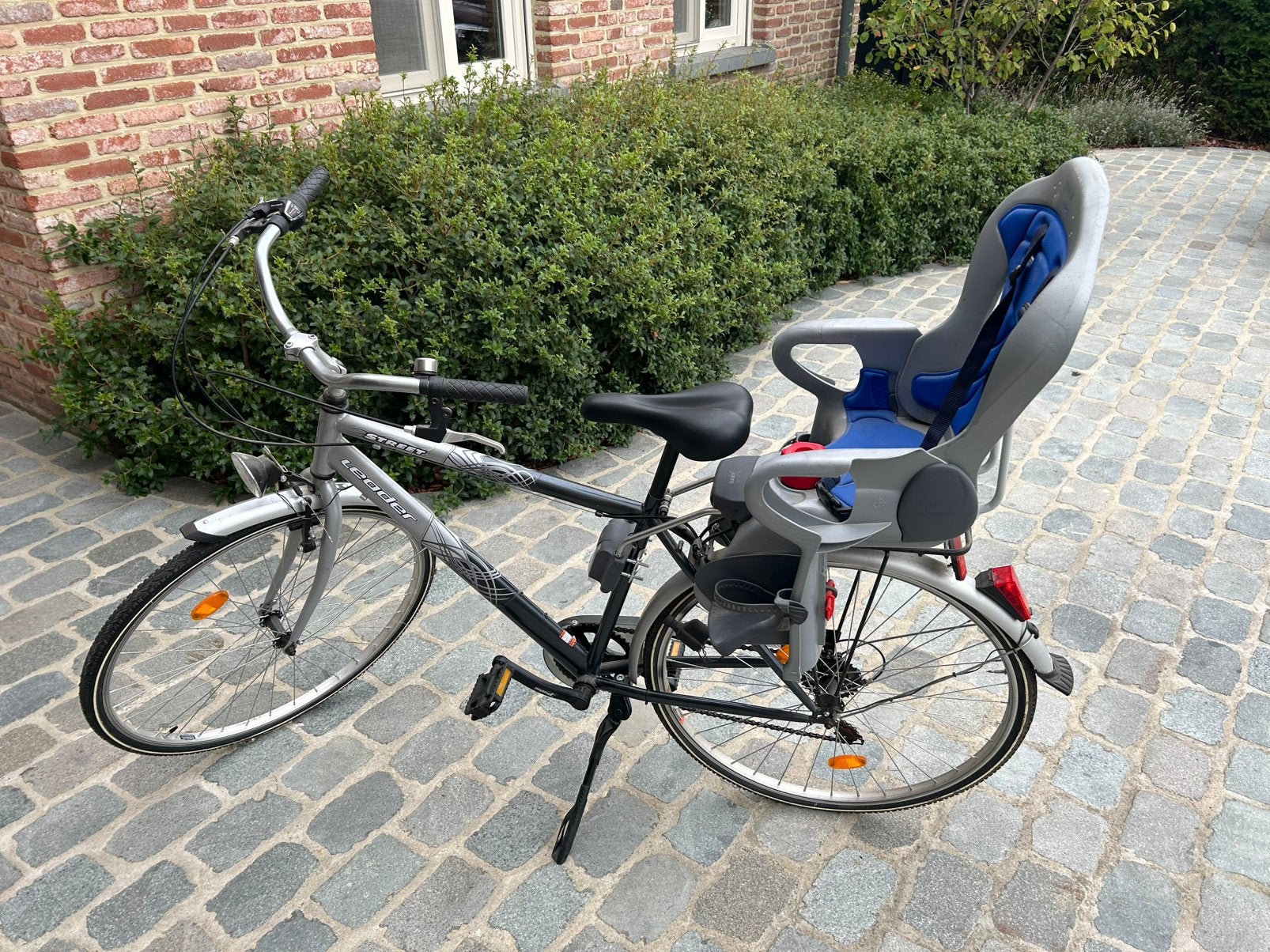 Herenfiets met kinderstoeltje te koop, Ophalen, Zo goed als nieuw