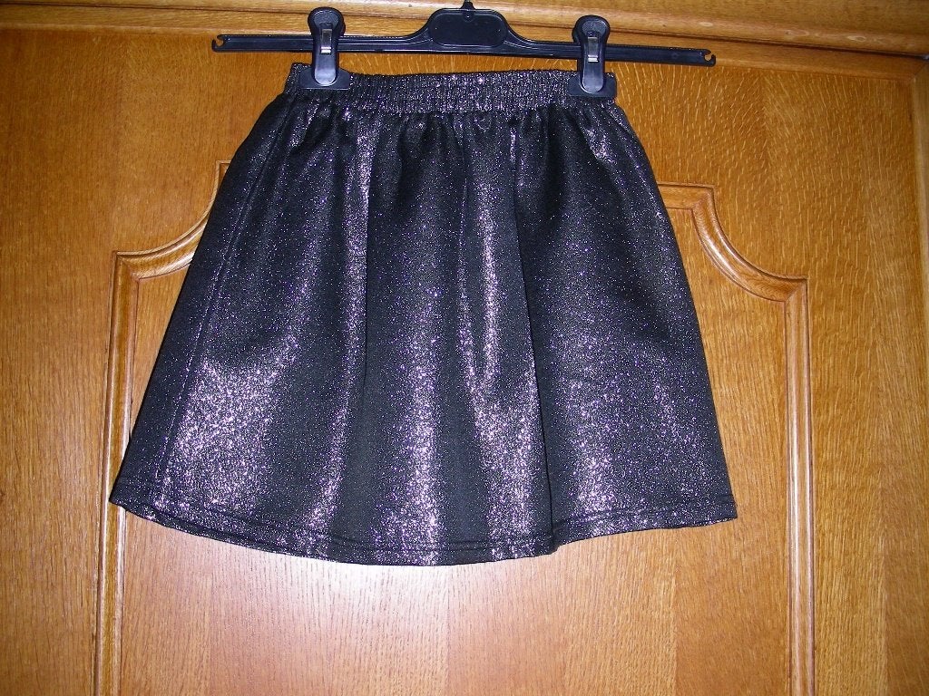 Zwart met goud glitter rokje, JBC Katja Retsin, mt 140, 10j, Meisje, JBC, Ophalen of Verzenden, Zo goed als nieuw