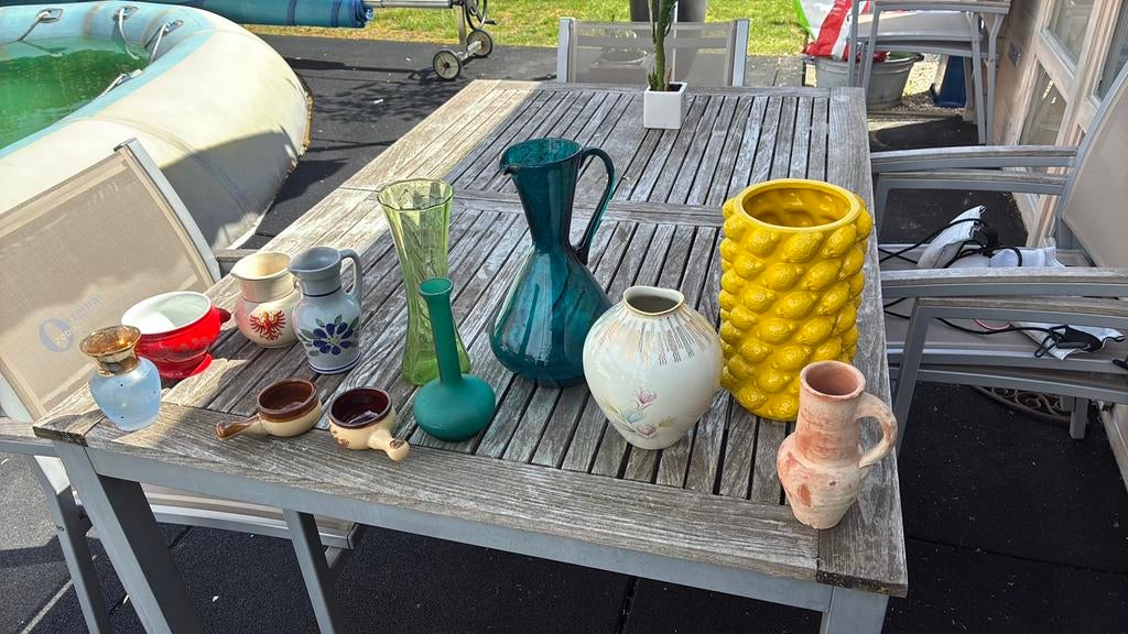 Lot vaasjes en potjes, Ophalen
