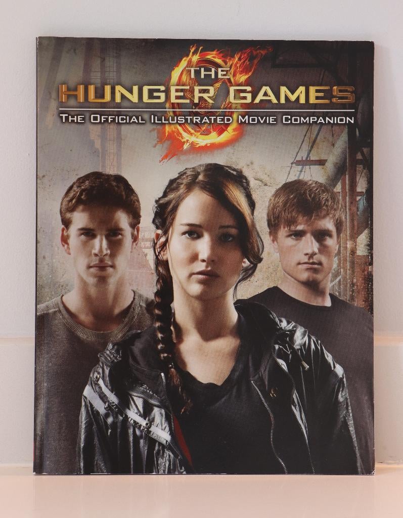 The Hunger Games — Compagnon officiel du film illustré, Livres, Enlèvement ou Envoi, Comme neuf