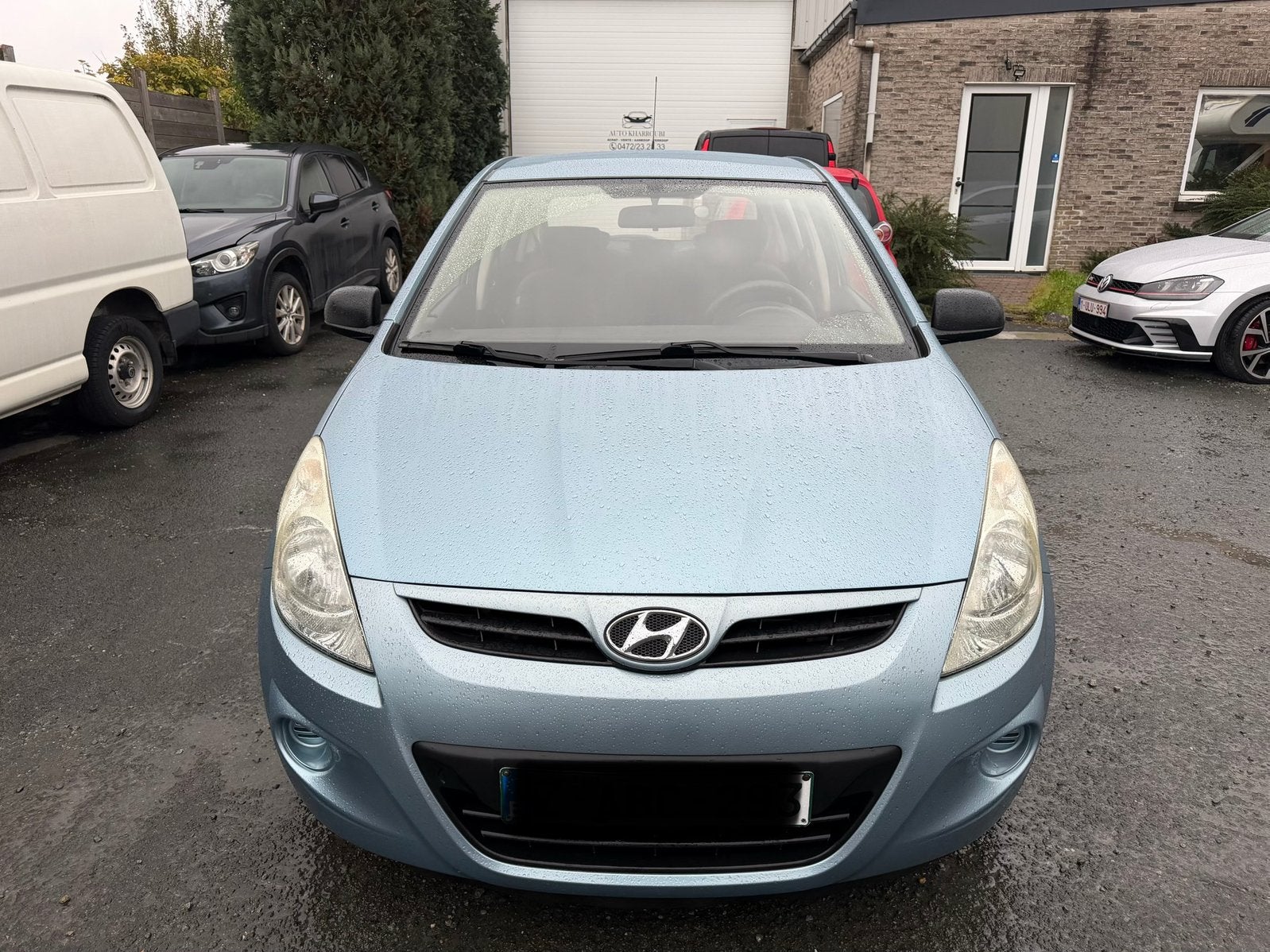 Hyundai i20 benzine met registratieverzoek., Auto's, Euro 5, Stof, Zwart, Blauw