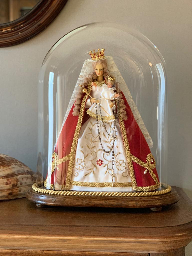 Madonna met Kind onder stolp, Ophalen