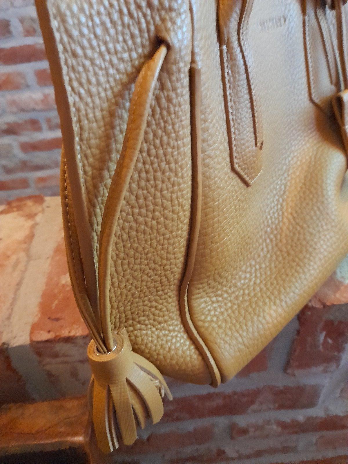 Handtas, Ophalen, Handtas