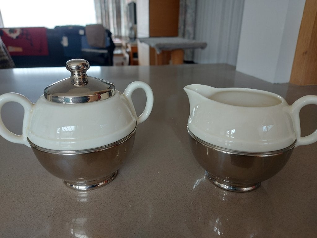 Melkannetje en Suikerpot Benraad Holland, Ophalen