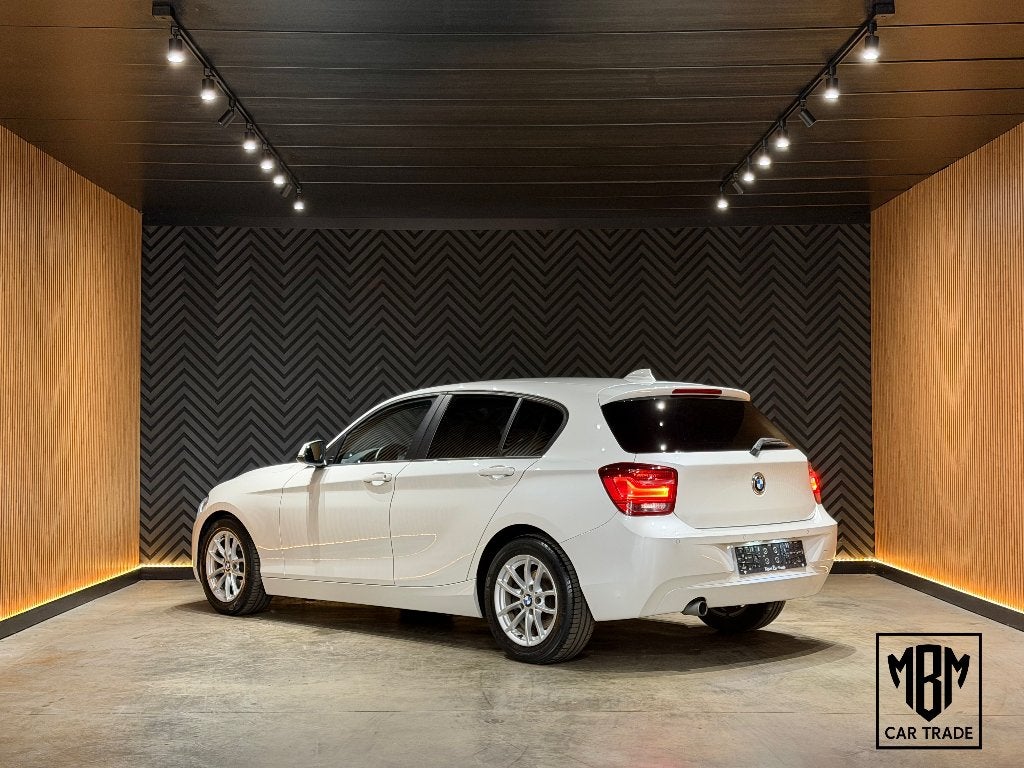 ✅ BMW 116 dA GARANTIE Automaat Navi Leer Zetelverwarm Xenon, Autos, Cuir, Euro 5, Achat, Ordinateur de bord