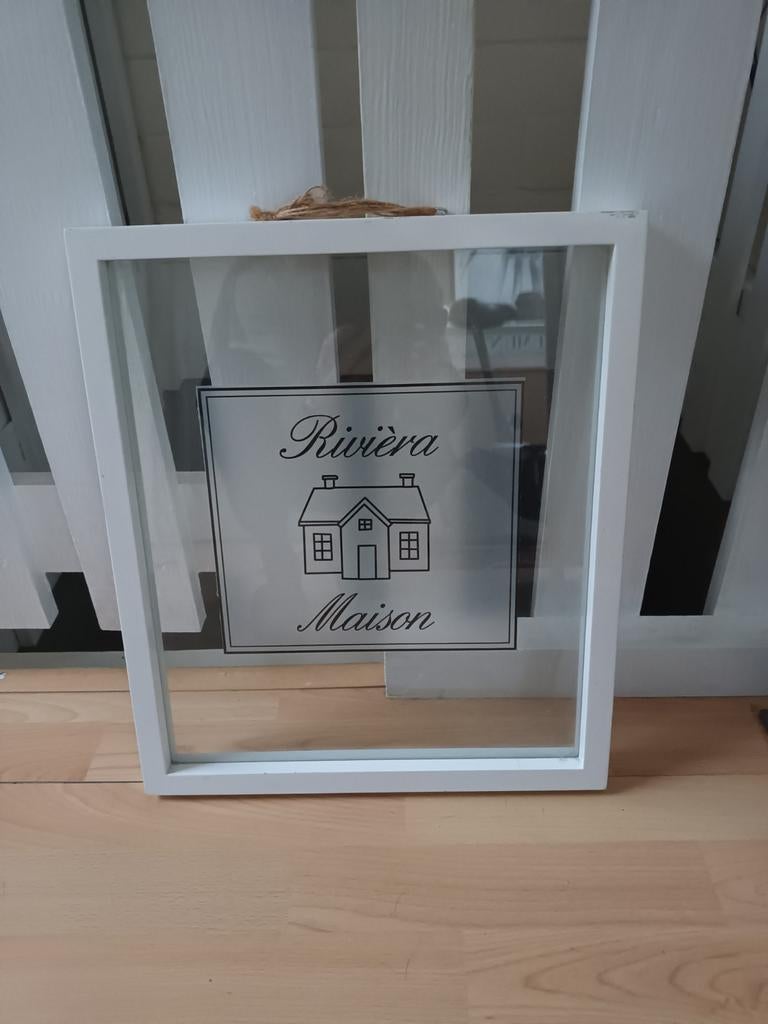Kader met teken van Riviera Maison, Ophalen