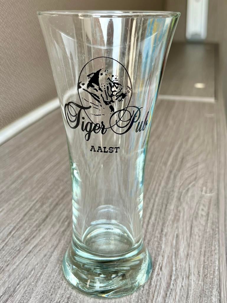 Aalst Oilsjt bier Tiger Pub 15cm hoogte 11 glazen, Ophalen, Zo goed als nieuw, Glas of Glazen, Overige merken