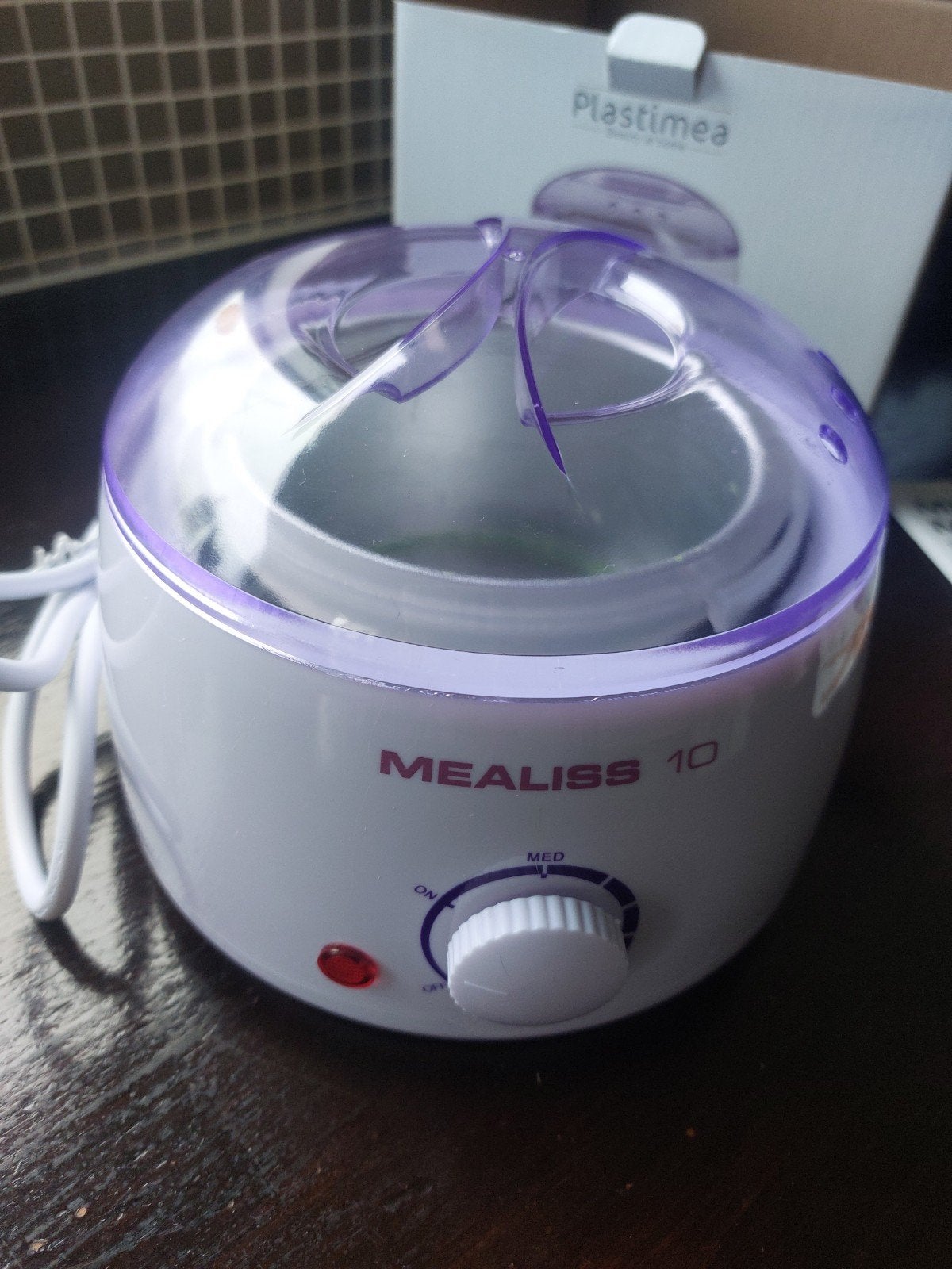 Professionele wax heater Plastimea Mealiss 10, Ophalen