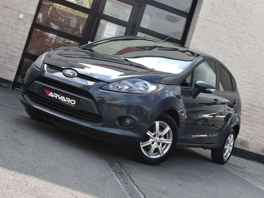 Ford Fiesta 1.25i Titanium / Airco / PDC / Verw Zetels / Top, Autos, Ford, 129 g/km, Entreprise, 82 ch, Boîte manuelle