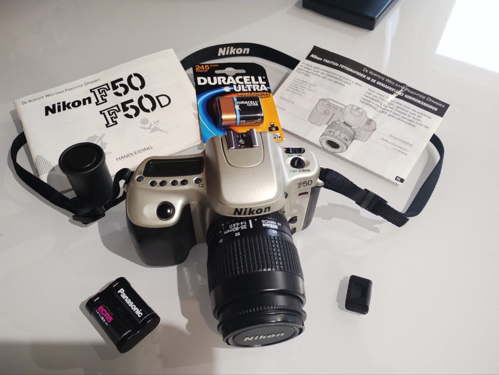 Fototoestel NIKON F50 met gebruiksaanwijzing, Ophalen, Nikon