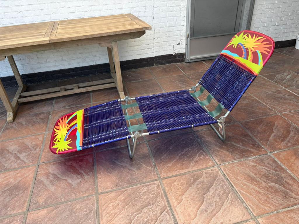 Kleurijke strandstoel, Ophalen